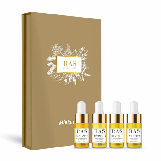 *Gift of Glow - 4-Piece Face Elixir Miniature Set